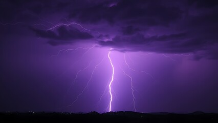 Dramatic purple lightning illuminating a stormy night sky, capturing raw natural energy.