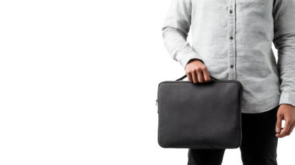 A man holding a black laptop bag in a casual setting, isolated on a white background.