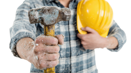 Construction worker holding a hammer and a safety helmet, ready for work on a building project.