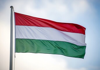 Obraz premium Hungarian flag waving in the sky