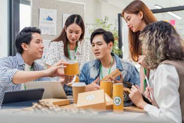 Creative ESG brainstorming session for earth friendly reuse recycle packaging campaign. Team develops viral environmental social impact strategy through sustainable innovation purpose driven marketing