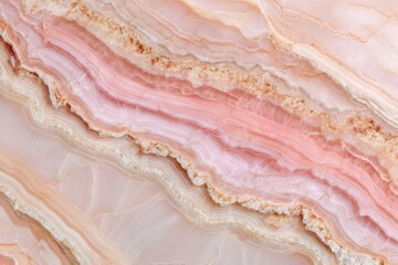 Close-up view of a natural stone with layers of peach and pink