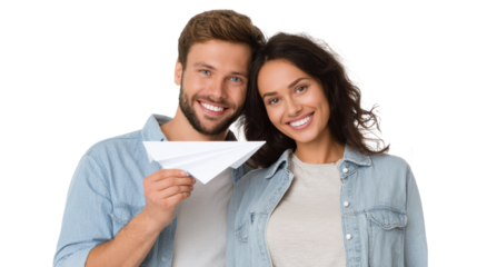 Happy couple enjoying playful moments with a paper airplane, white isolate background.
