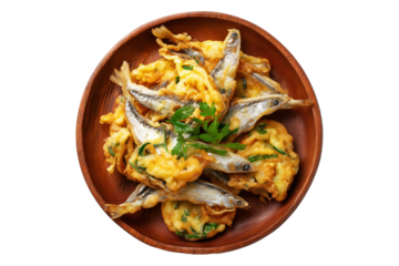Whitebait Fritters small fish mixed with egg and fried like pancakes on wooden plate, isolated on white transparent background. Concept of New Zealand cuisine