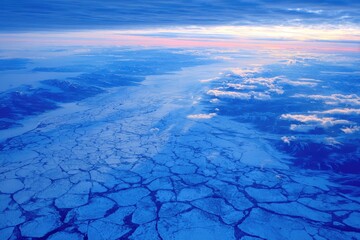 Aerial view of a glacier with fractured ice