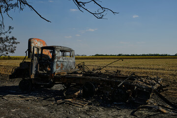 burned destroyed car in Ukraine
