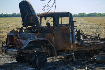 burned destroyed car in Ukraine