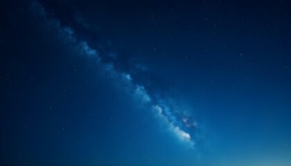 Fototapeta premium Satellite's Luminous Pathway Across the Celestial Canvas