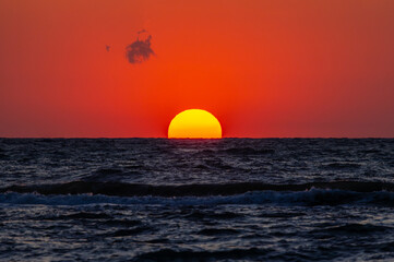 Sunrise over the sea. Landscape of the sun rising from the sea