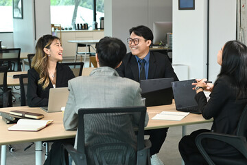 A group of business people partners during a set team meeting in the modern office.High quality