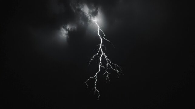 A dramatic lightning bolt strikes against a dark, cloudy sky.