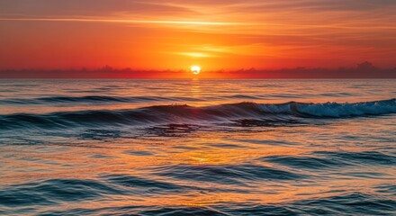 Obraz premium Vibrant Sunrise over Calm Ocean Waves.