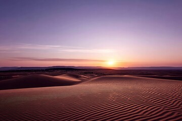 Desert sunrise over dunes, vibrant colors