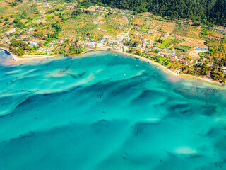 Seacoast with shades of turquoise water with beaches and blue lagoons in Karidi in Sithonia Peninsula, Vourvourou bay, Halkidiki, North Greece © Zedspider