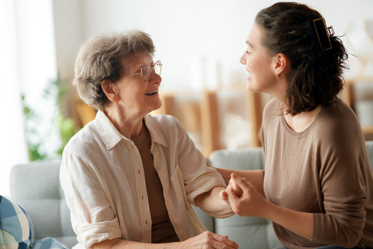 Happy patient and caregiver - Powered by Adobe