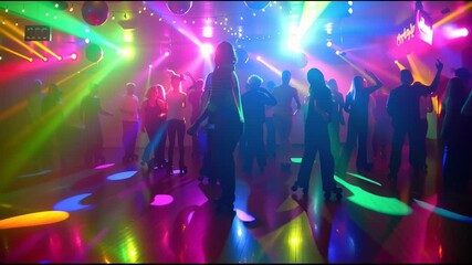Electrifying 1970s roller disco: neon lights, spinning disco balls, and vibrant crowd silhouettes on the rink. Skaters dance to disco rhythms amid dazzling color beams, shimmering reflections, and ret - Powered by Adobe