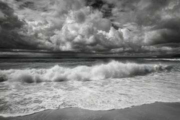 Fototapeta premium Black and White Seascape with Dramatic Clouds and Rolling Waves