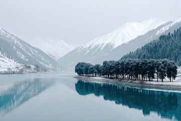 Frozen lake, snow-capped mountains
