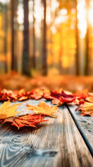 Colorful autumn leaves scattered on a rustic wooden table, with a blurred forest background showcasing warm seasonal hues and natural beauty