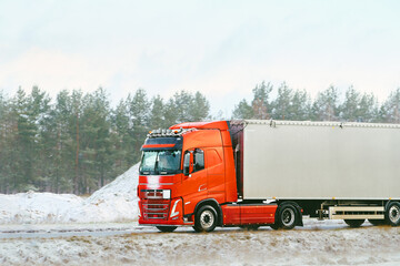 Truck hauling cargo on icy street