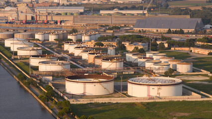 Close up view showcasing its chemical, petrochemical, and port industries at sunset, Ravenna, Italy