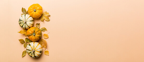 Autumn composition. Pattern made of dried leaves and other design accessories on table. Flat lay, top view