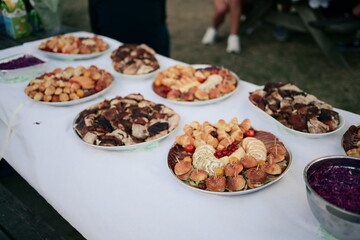 Gourmet Array A Delicious Spread of Savory Pastries and Grilled Delights