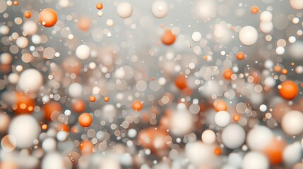 A digital illustration of a multitude of orange and white spheres scattered across a gray background.