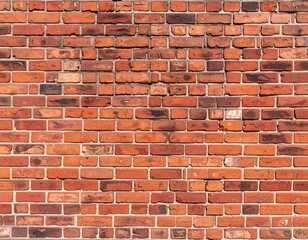 Naklejka premium Close-up view of a red brick wall