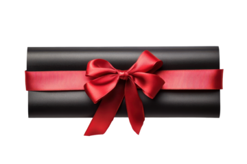 Red ribbon tied in a bow on a black gift box isolated on transparent background. Rolled diploma tied with a red ribbon bow isolated on white background.