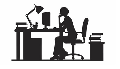 Silhouette of a person sitting at a desk with a computer lamp and books in a workspace setting shown