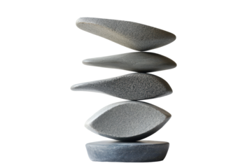 Stack of five smooth grey stones balanced on a blue base isolated on transparent background. Natural stacked smooth stones in a balanced arrangement isolated on white background.