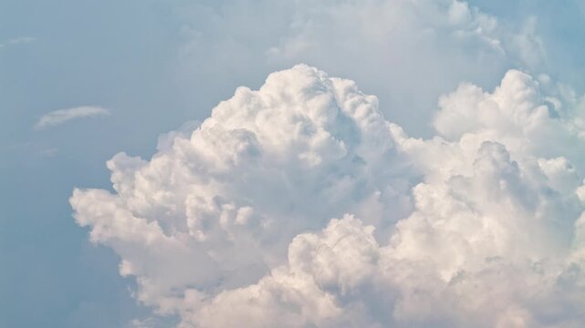 Time lapse rolling puffy clouds, moving white clouds timelapse. 4k fast motion footage of white clouds with blue sky in background.