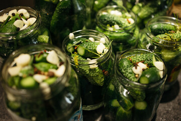 green cucumbers in a jar for pickling, preparations for the winter	