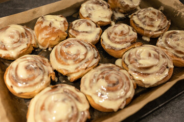 cinnamon buns with delicious cream just from the oven