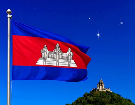 Cambodian flag waving at night, Angkor Wat visible in background