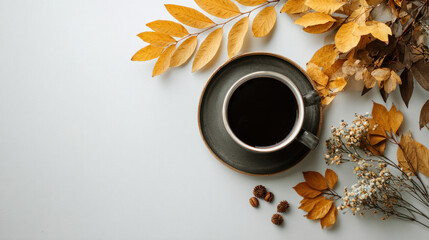 Cozy autumn coffee scene with golden leaves, ideal for Thanksgiving or winter holidays.