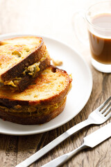 Grilled tuna and cheese sandwiches on sourdough bread.