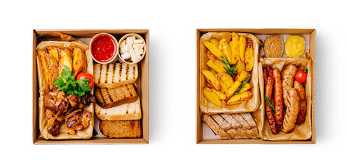 Deliciously arranged gourmet food boxes filled with various dishes and sides