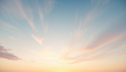 Fototapeta premium Softly lit sky with wispy clouds at sunset creates a tranquil backdrop for contemplation and peaceful reflection