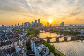 Obraz premium Frankfurt City Downtown, Residential Buildings, Bridges and Main River at Sunset. Wide Shot. Aerial View. Golden Hour. Hesse, Germany