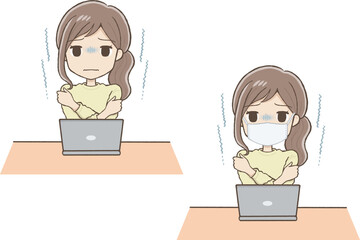 Woman in yellow clothes shivering with cold in front of a laptop