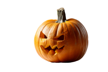 Carved pumpkin with a spooky face for Halloween
