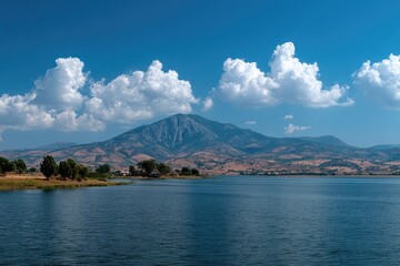 Serene lake vista under a vast blue sky