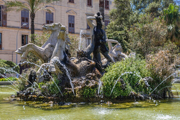 Triton Fountain located on Square of Victor Emmanuel in Trapani, capital of Trapani Province on Sicily Island in Italy