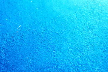 Vibrant Blue Wall with Rough Texture