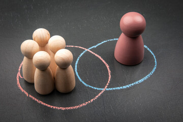 Social exclusion and individuality concept with colored figure and group separation