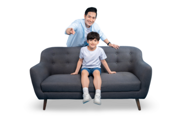 A heartwarming moment captured as a father and son share a tender moment. Father is pointing something .The sofa providing a sense of comfort and connection on PNG background