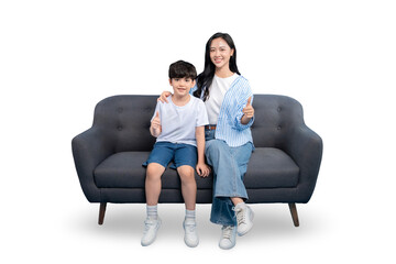 Obraz premium Mother and child sitting on a gray sofa. The woman and child give a thumbs up on PNG background