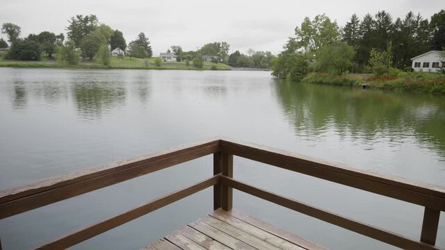 A pier overlooking a lake at a local park.
